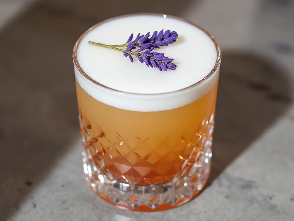 The Duchamps Cocktail (cocktail, sour, ) - Duchamp's Punch is a contemporary twist on the classic South American Pisco Sour family.  The addition of St. Germain, lavender, and pepper adds modern complexity and a touch of floral intrigue, making it a unique and flavorful take on the iconic cocktail. 