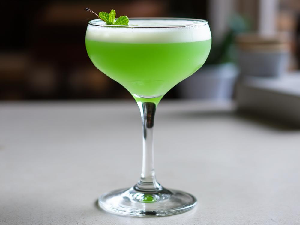 The Grasshopper Cocktail: A Minty Leap into Drink Bliss! (cocktail, creme, %!s(<nil>)) - The Grasshopper belongs to the creamy liqueur family, specifically a mint chocolate variation. Originating in the 1950s, its name reflects the green hue and purportedly, its hopping popularity. 