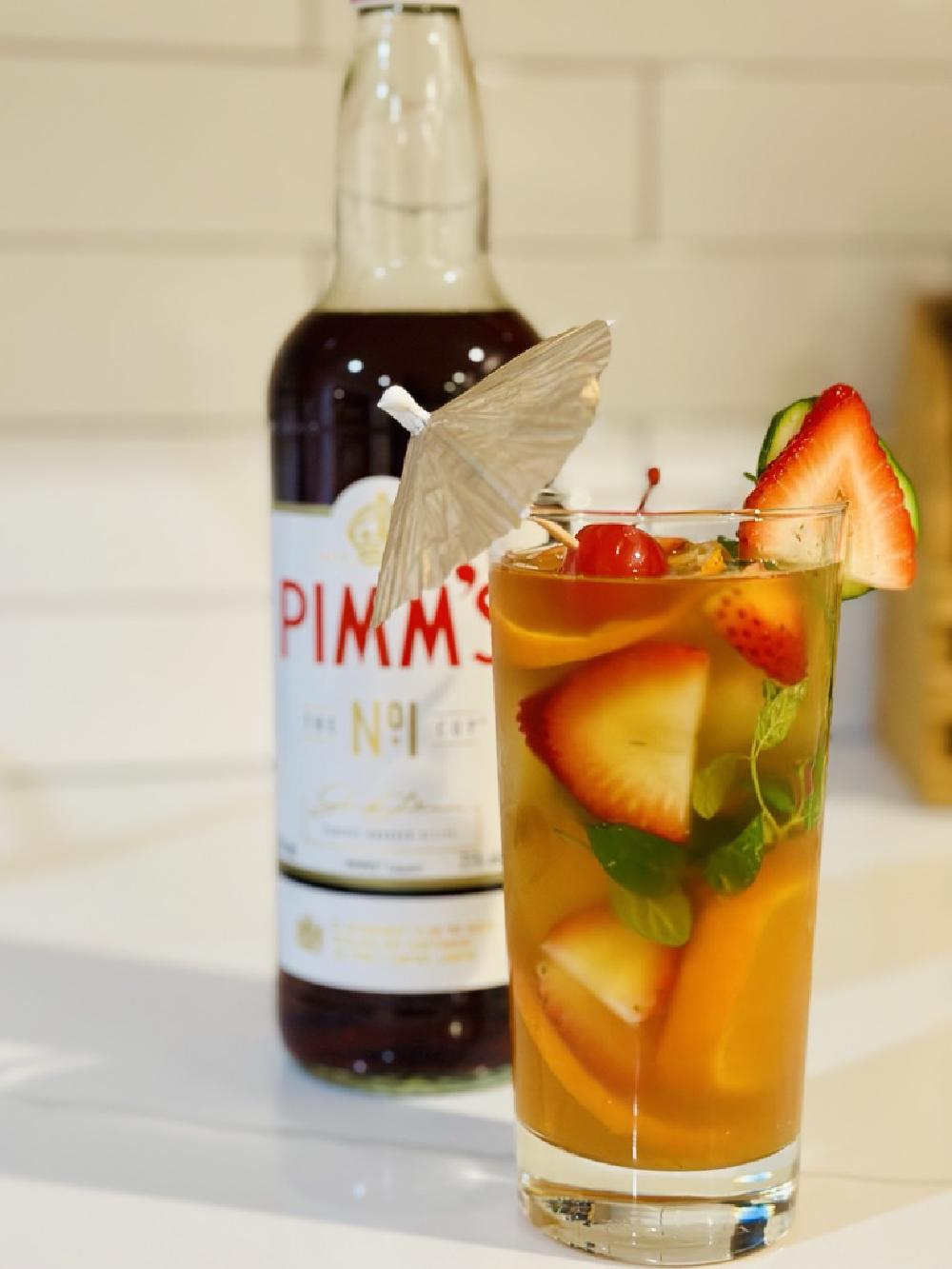 The Pimms Cup Cocktail (cocktail, highball, ) - The Pimm's Cup belongs to the **Gin & Tonic family**, a group of refreshing, spirit-based drinks. Its origins lie in **19th century England**, where the Pimm's brothers created a gin-based liqueur specifically designed for mixing with lemonade and fruit. 